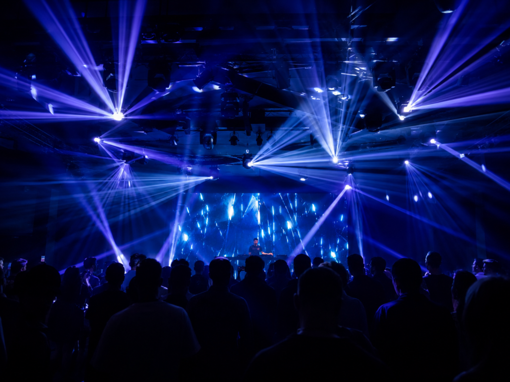 300W beam moving head lights creating prism effects in a live entertainment venue