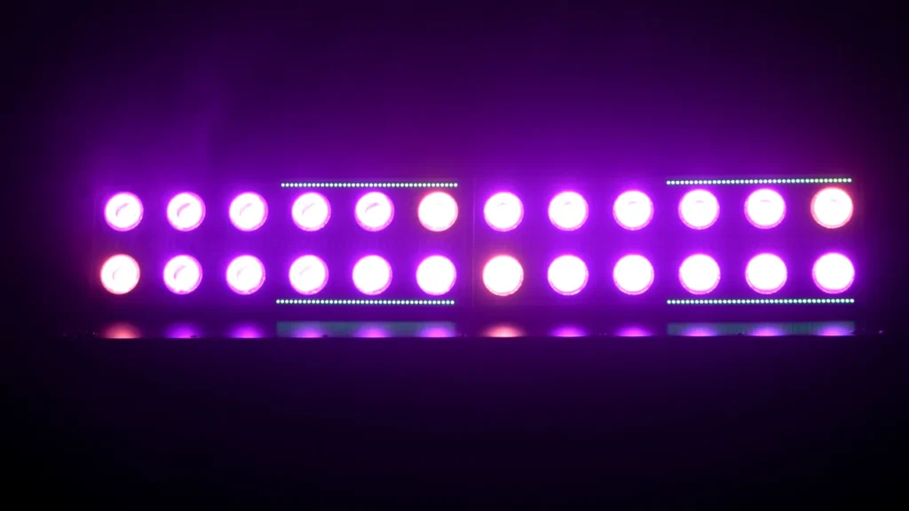LED strobe fixture with purple and white light zones