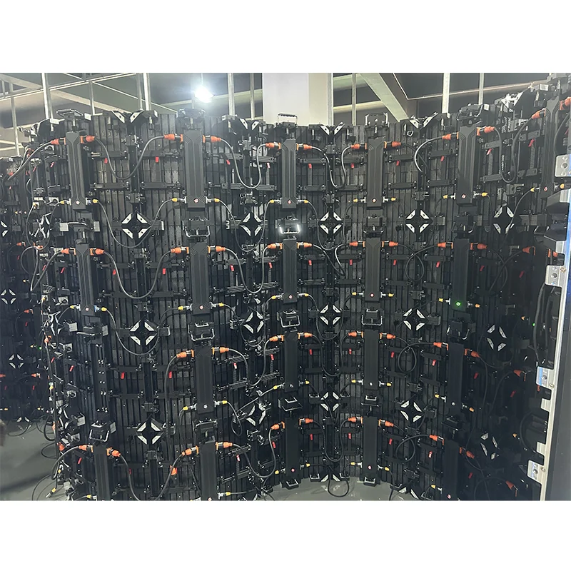 Rear view of multiple indoor LED cabinets assembled into a concave curved display wall