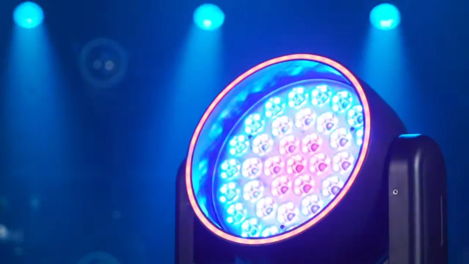 Close-up of RGBW wash moving head lens array during a color cue