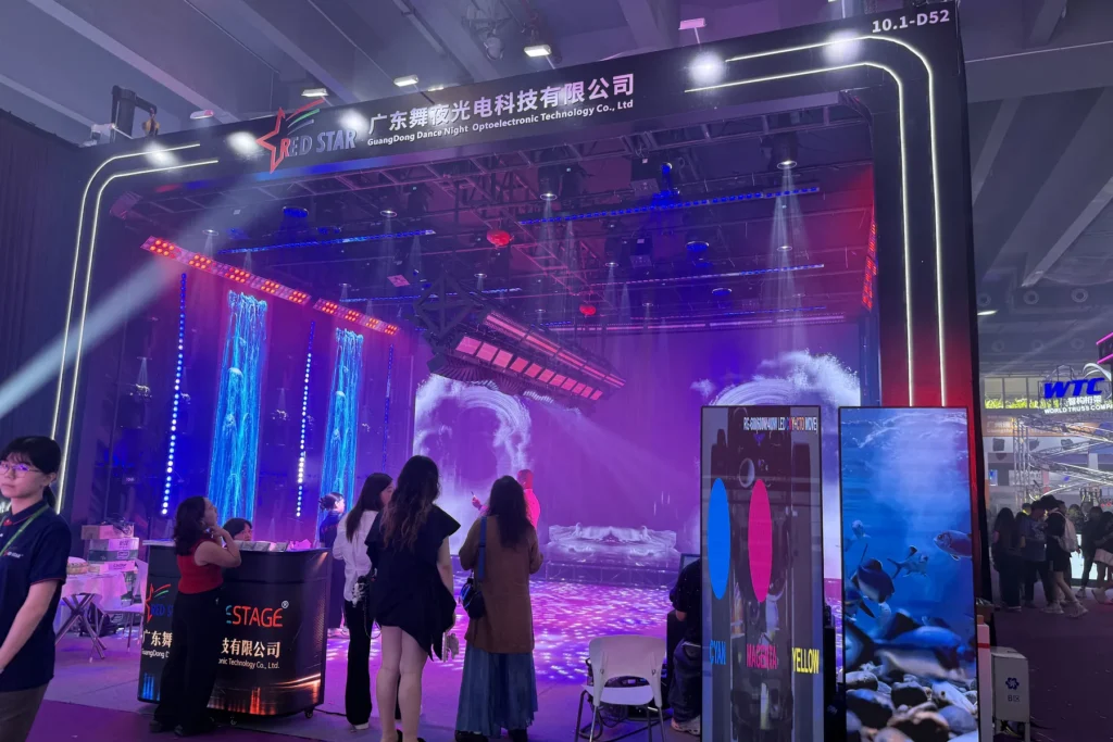 WUYESTAGE 2026 Guangzhou exhibition booth with LED display and stage lighting demonstration