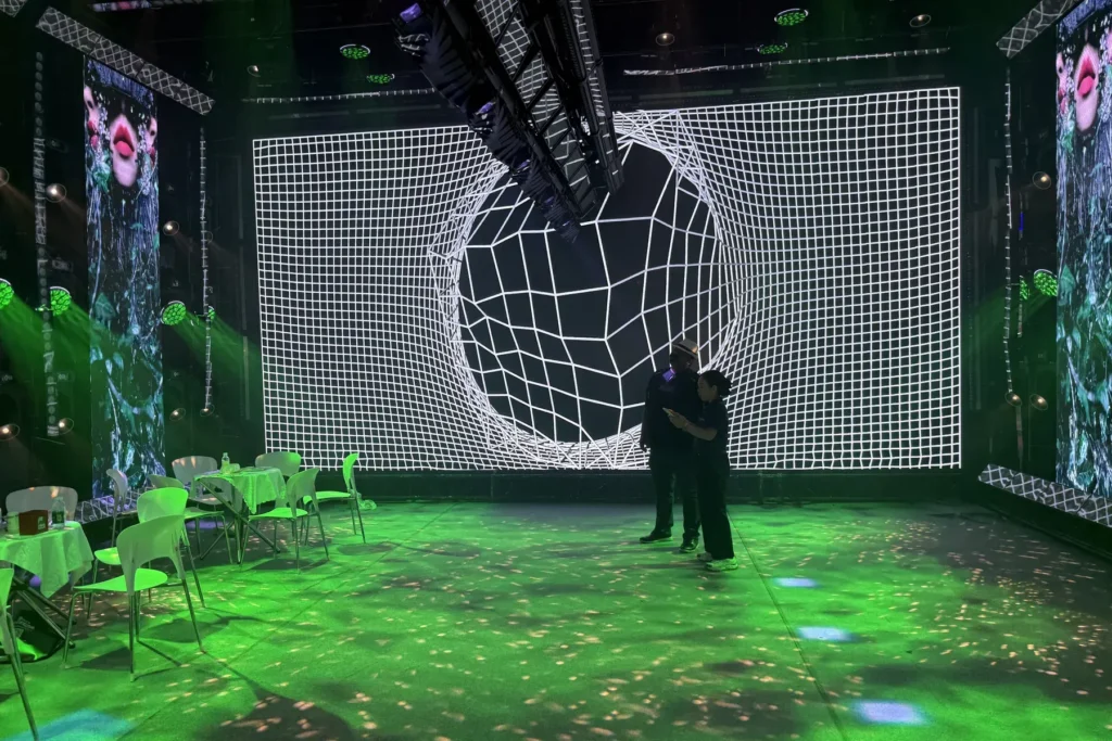 Monochrome LED display content and stage lighting demonstration at the WUYESTAGE Guangzhou exhibition