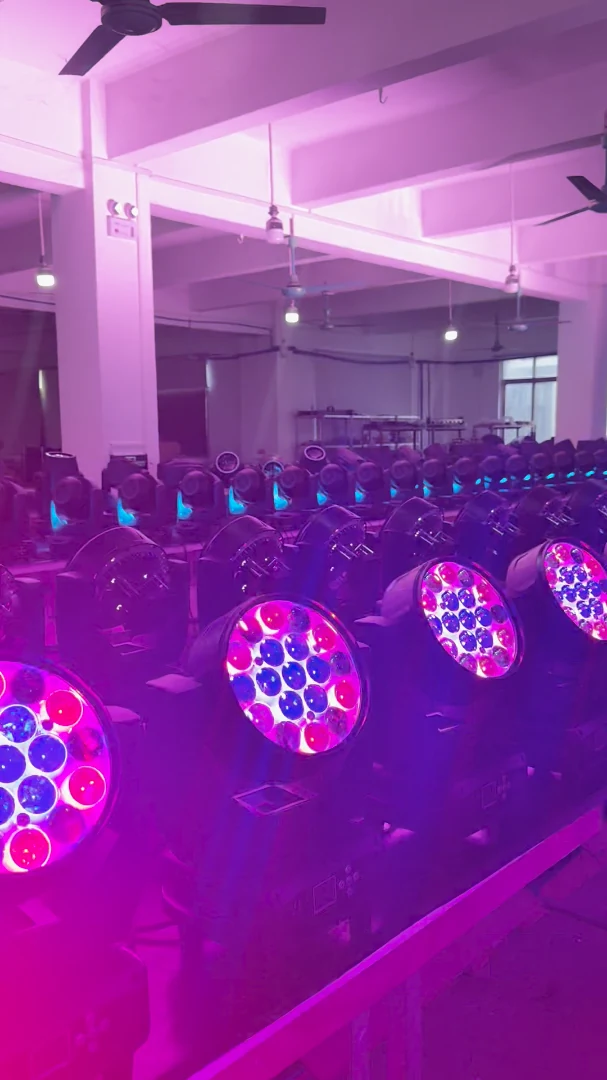 19-LED Zoom Wash Moving Head Light — Rows of 19-lens moving heads showing magenta and blue output in a workshop