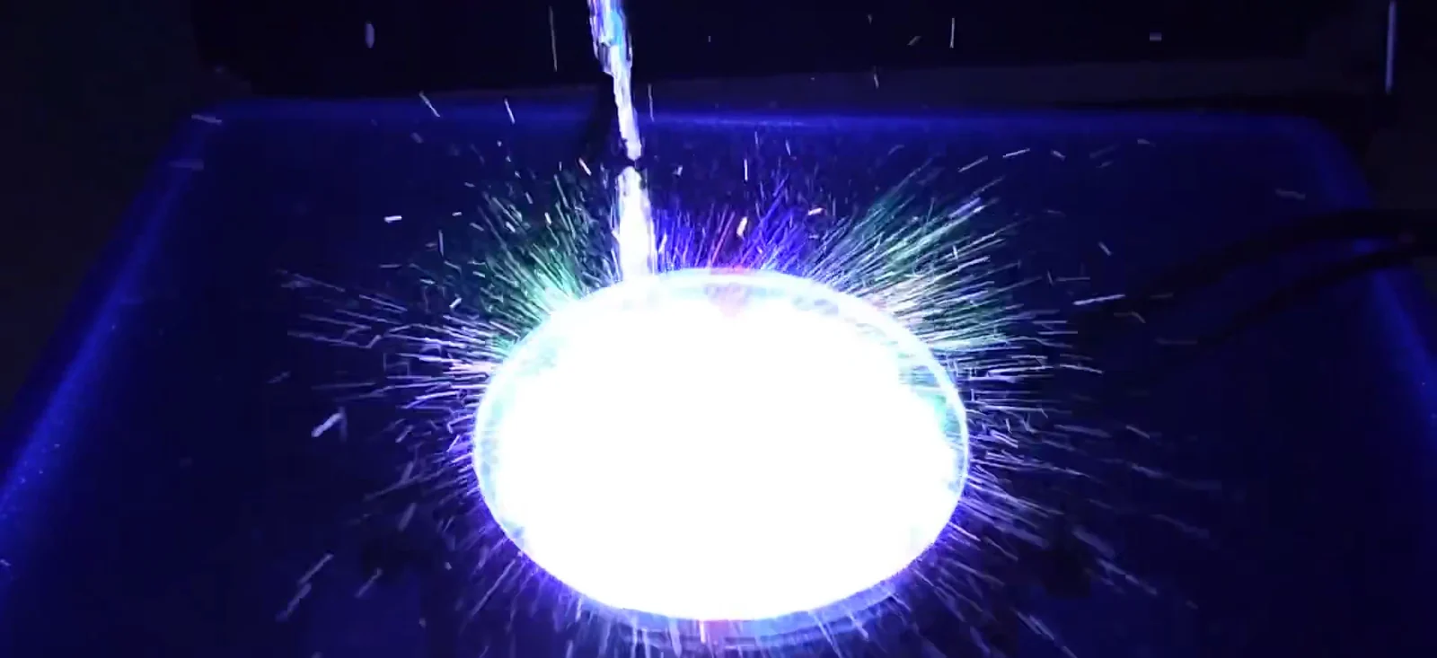 RG-401B fixture shown during an IP65 spray-test demonstration