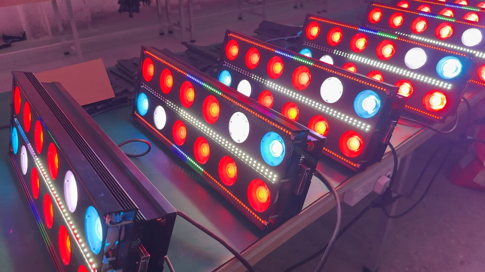 Multiple RGBW pixel strobe fixtures illuminated during an effect check