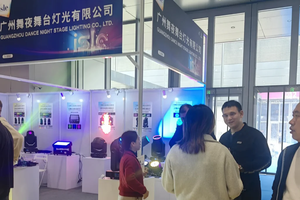 WUYESTAGE representative demonstrating stage lighting products to visitors in Shenzhen