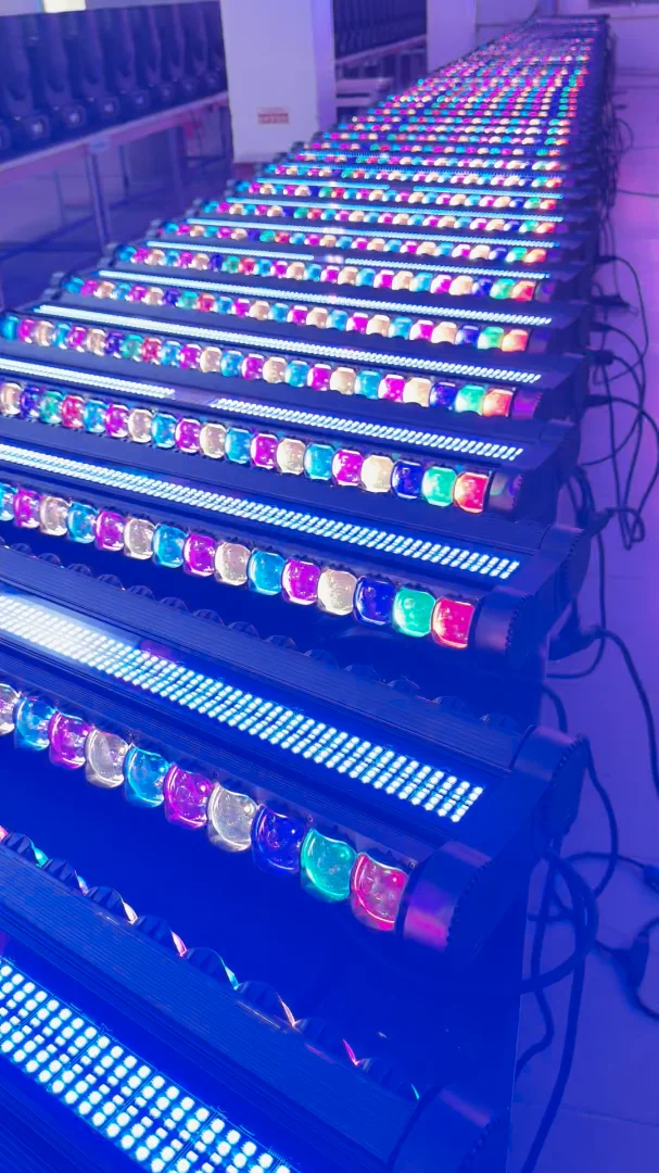 Rows of illuminated RG-906 fixtures in blue and mixed colors