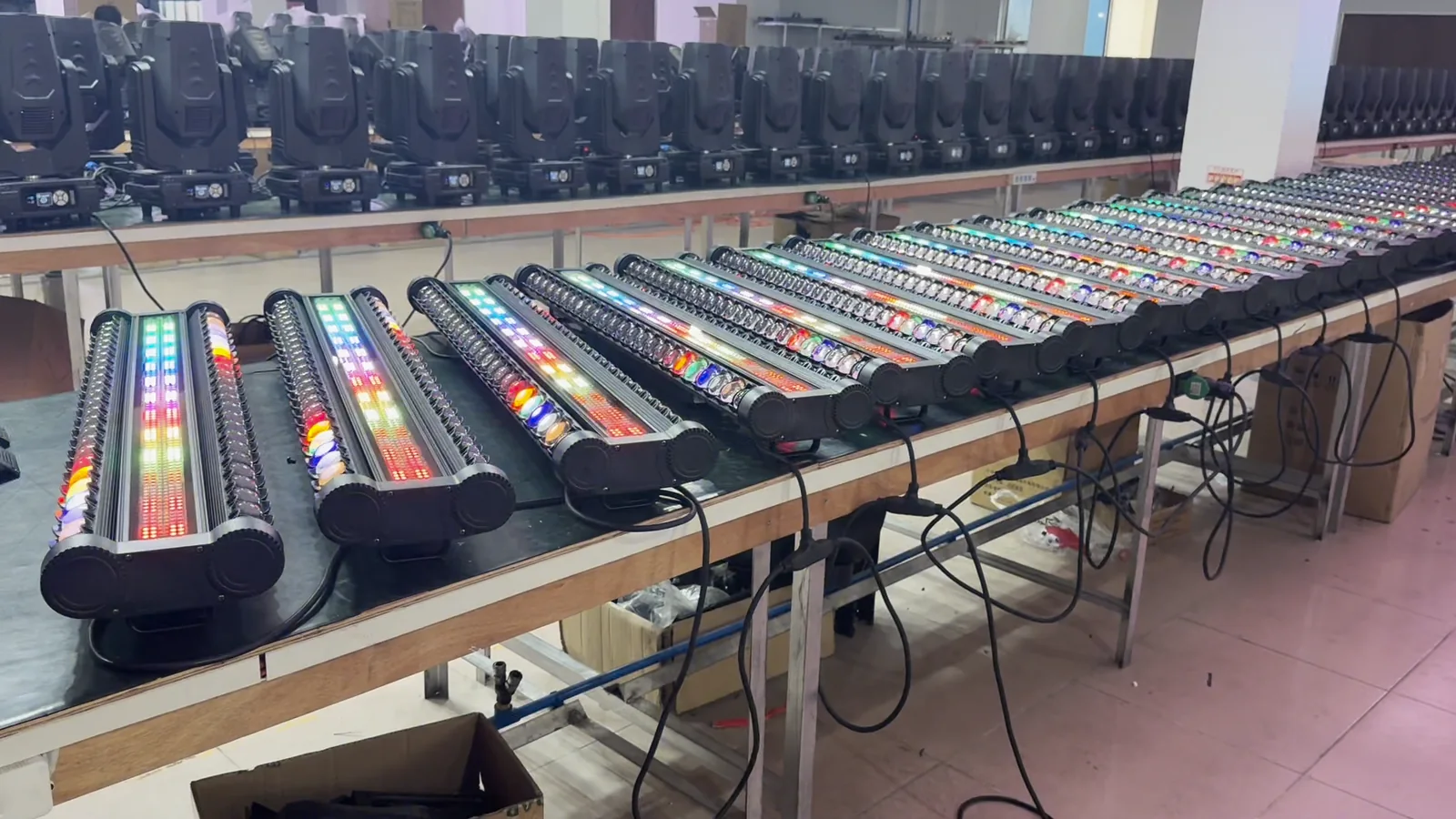 Multiple powered RG-906 fixtures across a workbench