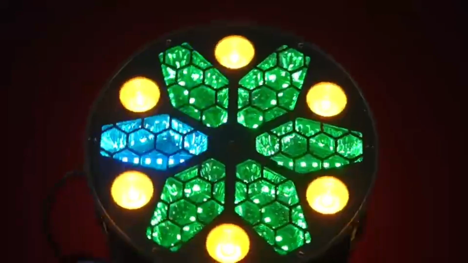 Supplied close-up of illuminated circular sources and green and blue radial segments