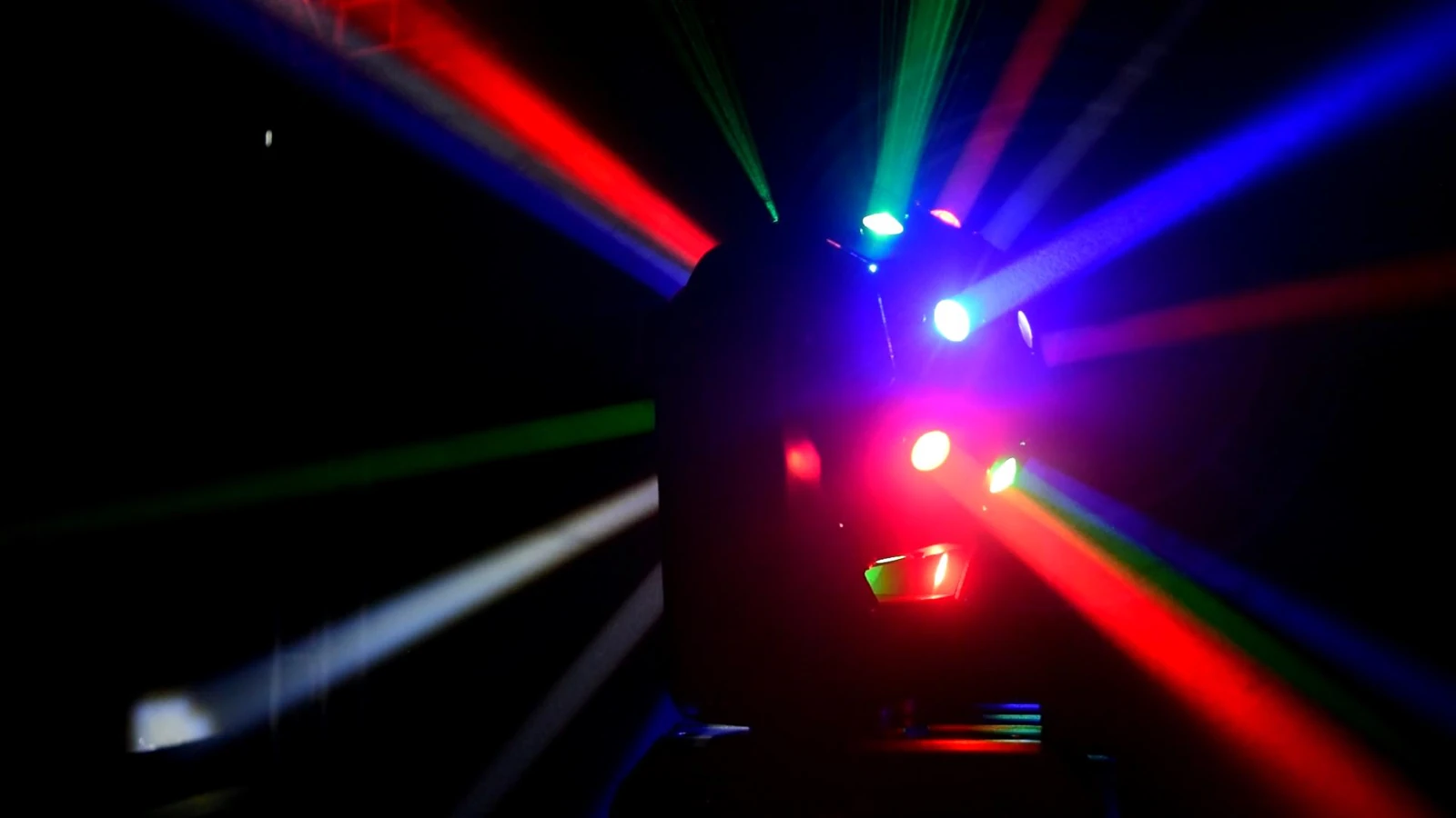 Close demonstration of red, green, blue and white beams