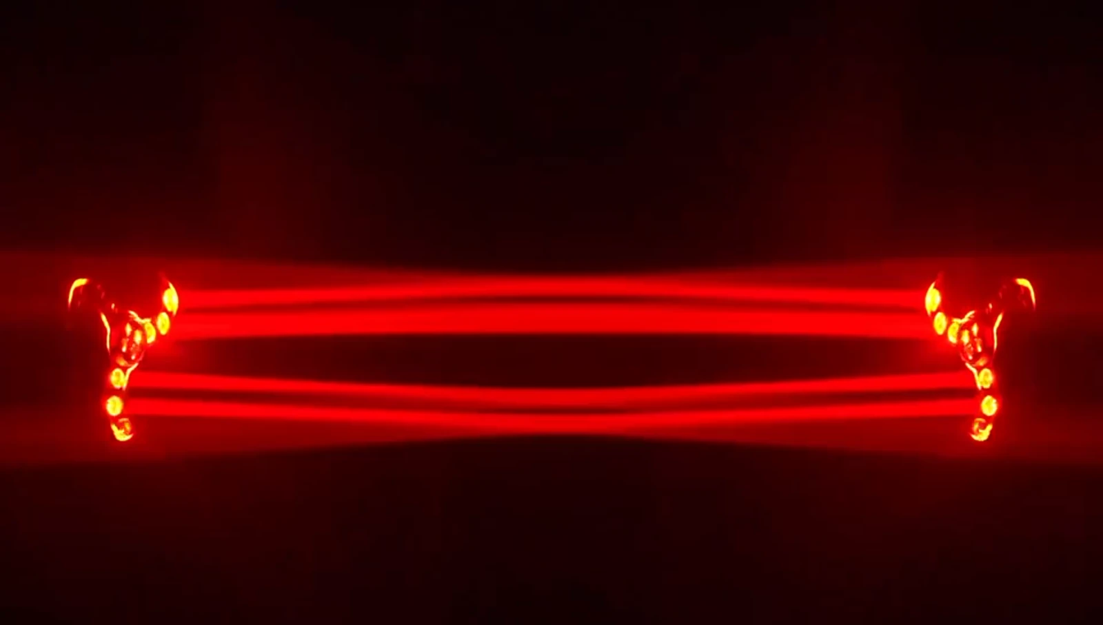 Supplied paired fixture demonstration with horizontal red beams