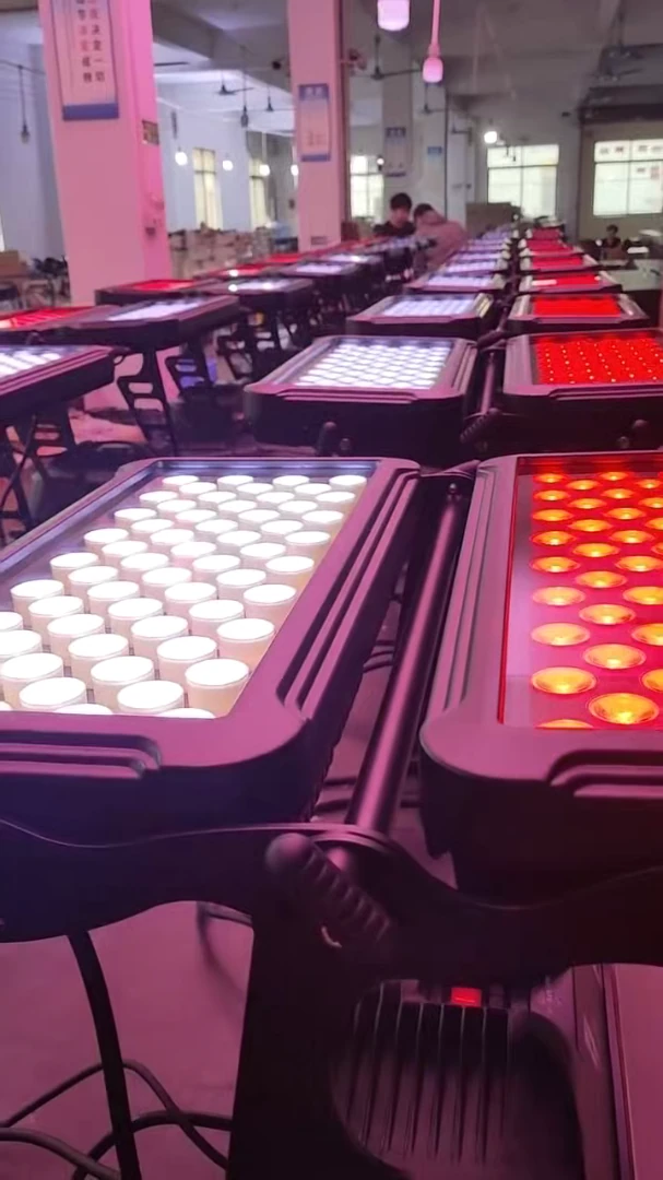 User-confirmed RG-302 production-scene photograph showing fixtures illuminated white and red