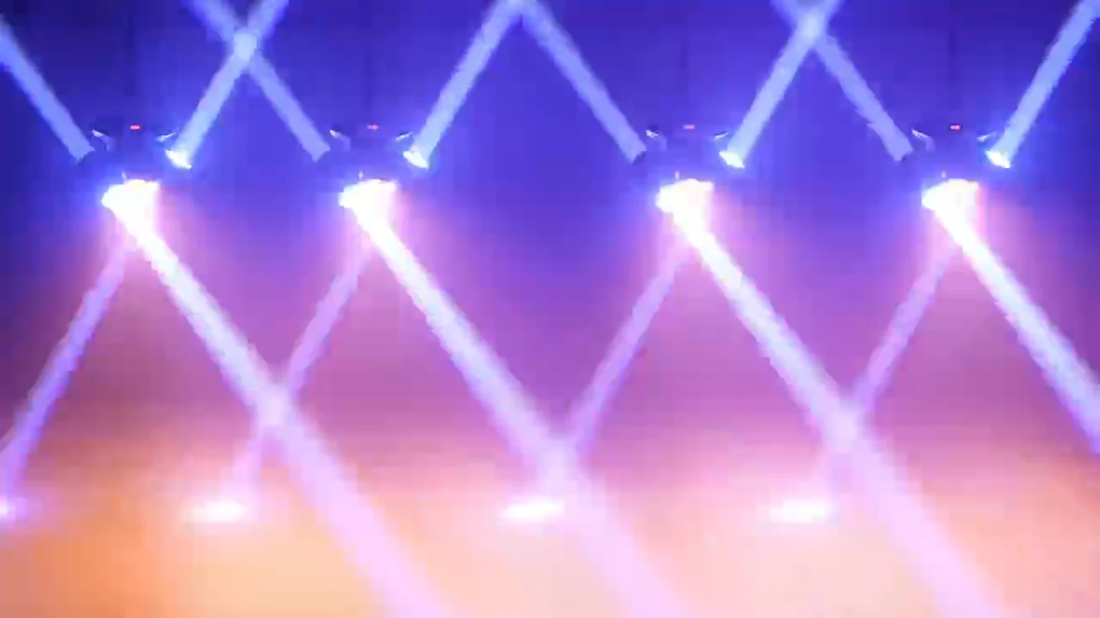 Supplied multi-fixture demonstration with crossing white aerial beams