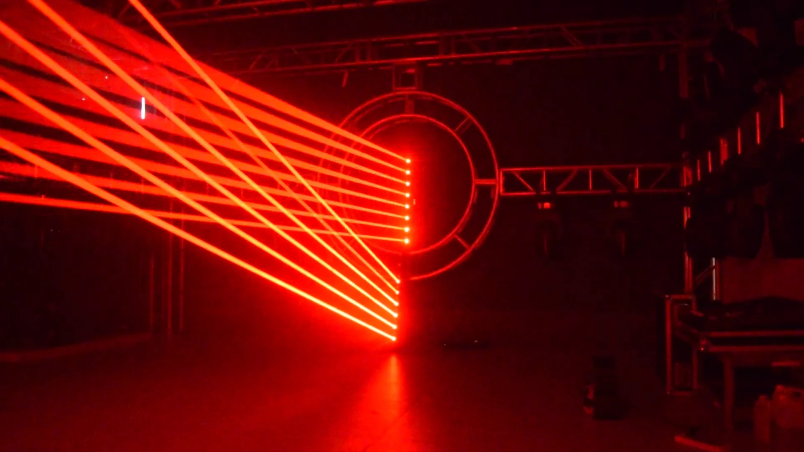 Crossing red laser beams from two bars in a demonstration setup