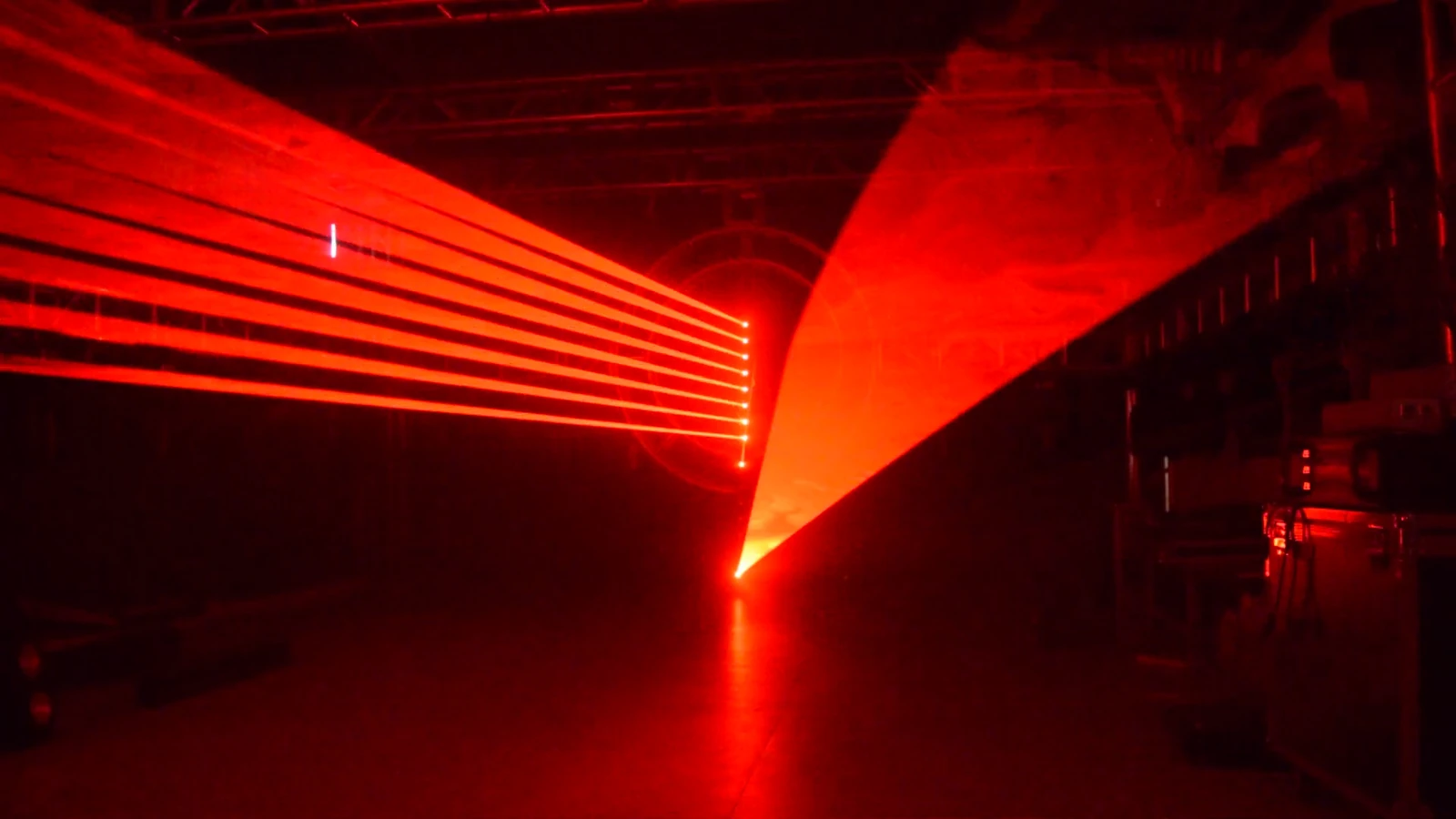 Red parallel beams and a sweeping red look from multiple bars in a demonstration